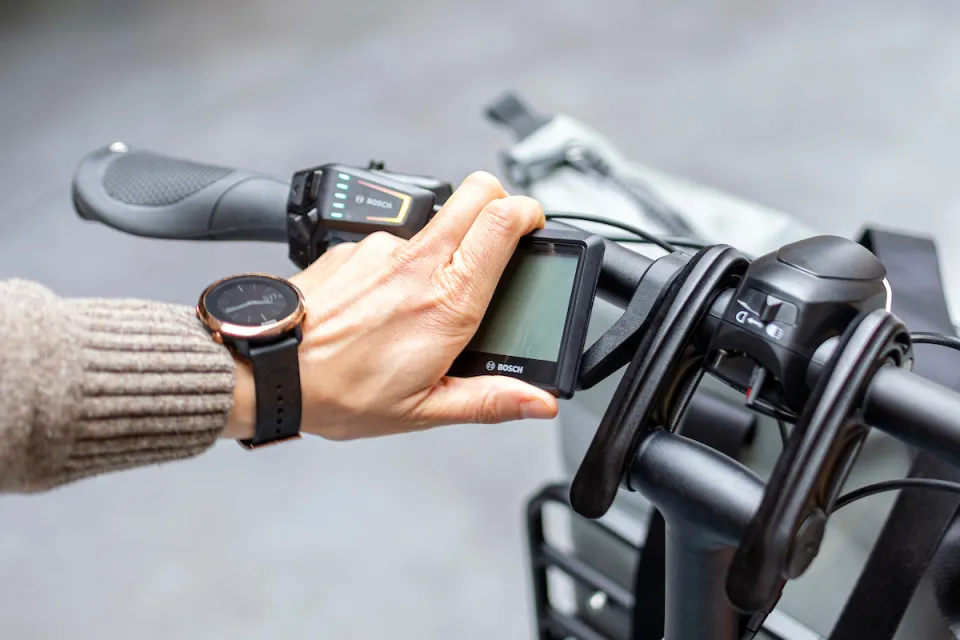LED Remote with Intuvia 100 display being removed from the Tern HSD Gen 2 P-Class electric cargo bike handlebar.